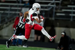 Westside High School Keynan Cotton (10) runs in for a touchdown during a game between the Millard South and Omaha Westside in Omaha, NE on Sunday October 13th, 2023. Photo by Eric Francis