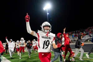 Westside High School Drew Kline (19) and teammates celebrate a westside pick six˜˜ during a game between the Millard South and Omaha Westside in Omaha, NE on Sunday October 13th, 2023. Photo by Eric Francis
