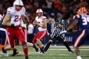 Nebraska Cornhuskers Heinrich Haarberg (10) drops back to make a pass against the Illinois Fighting Illini during a college football game in Lincoln, Nebraska, Friday, October 6, 2023. Photo by John Peterson.