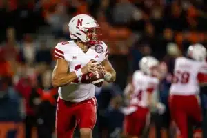 Nebraska Cornhuskers Heinrich Haarberg (10) rolls out to throw a pass against the Illinois Fighting Illini during a college football game in Lincoln, Nebraska, Friday, October 6, 2023. Photo by John Peterson.