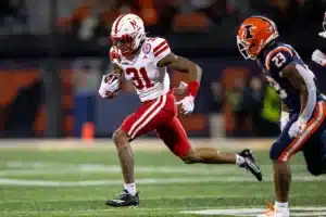 Nebraska Cornhuskers Tommi Hill (31) runs the ball after making an interception against Illinois Fighting Illini defensive lineman TeRah Edwards (23) during a college football game in Lincoln, Nebraska, Friday, October 6, 2023. Photo by John Peterson.