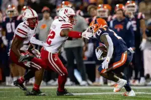 DUPLICATE***Nebraska Cornhuskers Mikai Gbayor (42) reaches out to tackle Illinois Fighting Illini running back Reggie Love III (23) during a college football game in Lincoln, Nebraska, Friday, October 6, 2023. Photo by John Peterson.