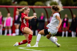 Nebraska Cornhuskers Sarah Weber (42) battles to get past the Maryland Terrapins in the first half during a college soccer match Thursday, October 12, 2023, in Lincoln, Neb. Photo by John S. Peterson.