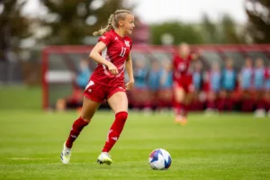 Nebraska Cornhuskers Sadie Waite (11) looks for an open team to pass to against the Maryland Terrapins in the first half during a college soccer match Thursday, October 12, 2023, in Lincoln, Neb. Photo by John S. Peterson.