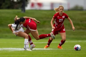 Nebraska Cornhuskers Sarah Weber (42) gets tied up with Maryland Terrapins forward/midfielder Lisa McIntyre (22) in the second half during a college soccer match Thursday, v