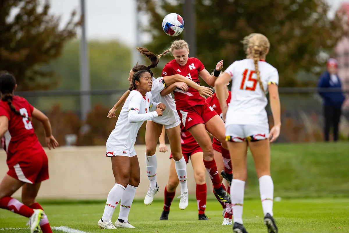 Nebraska Cornhuskers Eleanor Dale (9) heads the ball in for her second goal against the Maryland Terrapins late in the second half during a college soccer match Thursday, October 12, 2023, in Lincoln, Neb. Photo by John S. Peterson.