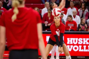 Nebraska Cornhusker Merritt Beason (13) digs the ball in warm-ups before taking on Penn State Nittany Lions during a college volleyball match on Saturday, October 14, 2023, in Lincoln, Nebraska. Photo by John S. Peterson.