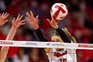 Nebraska Cornhusker Andi Jackson (15) blocks a shot from Penn State Nittany Lions in the first set during a college volleyball match on Saturday, October 14, 2023, in Lincoln, Nebraska. Photo by John S. Peterson.