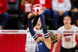 Nebraska Cornhusker Andi Jackson (15) blocks Penn State Nittany Lions Mac Podraza (5) in the first set during a college volleyball match on Saturday, October 14, 2023, in Lincoln, Nebraska. Photo by John S. Peterson.