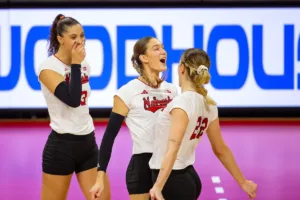 Nebraska Cornhuskers Andi Jackson (15) and  Lindsay Krause (22) celebrate a killa against the Penn State Nittany Lions in the second set during a college volleyball match on Saturday, October 14, 2023, in Lincoln, Nebraska. Photo by John S. Peterson.