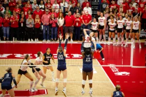 Nebraska Cornhusker Lindsay Krause (22) scores the match point in set three against the Penn State Nittany Lions during a college volleyball match on Saturday, October 14, 2023, in Lincoln, Nebraska. Photo by John S. Peterson.