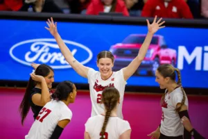 Nebraska Cornhusker Lindsay Krause (22) celebrates a kill against the Penn State Nittany Lions in the third set during a college volleyball match on Saturday, October 14, 2023, in Lincoln, Nebraska. Photo by John S. Peterson.