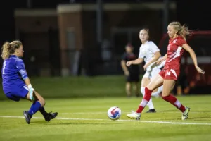 Nebraska Cornhuskers Sadie Waite (11) scores a goal against Purdue Boilermakers Charlotte Cyr (1) in the second half during a college soccer game on Thursday, October 19, 2023, in Lincoln, Nebraska. Photo by John S. Peterson.