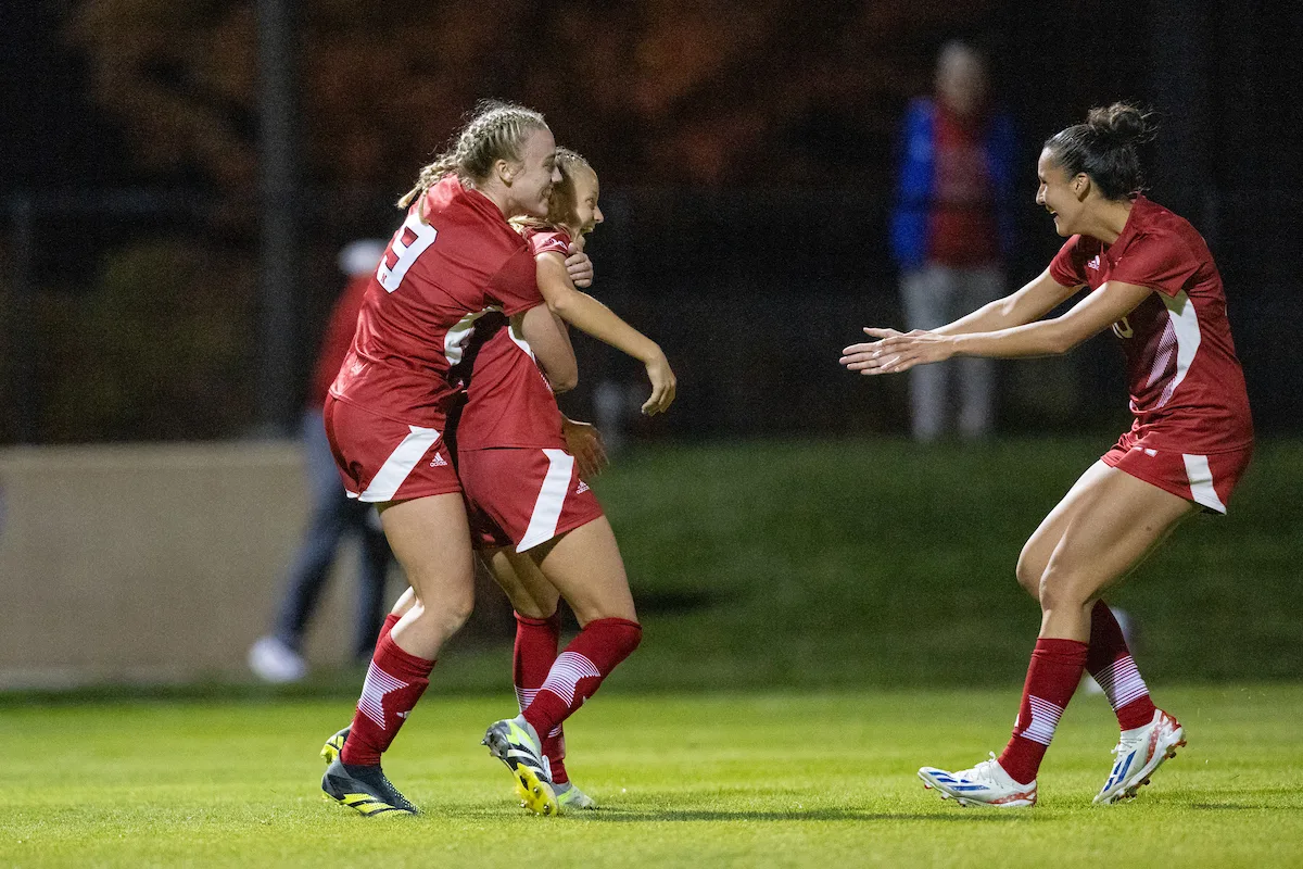 Nebraska Cornhuskers Sadie Waite (11) gets a hug from Eleanor Dale (9) after scoring a goal against Purdue Boilermakers in the second half during a college soccer game on Thursday, October 19, 2023, in Lincoln, Nebraska. Photo by John S. Peterson.