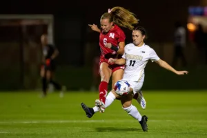 Nebraska Cornhuskers Abbey Schwarz (6) fights for the ball against Purdue Boilermakers Brooke Haarala (11) in the first half during a college soccer game on Thursday, October 19, 2023, in Lincoln, Nebraska. Photo by John S. Peterson.