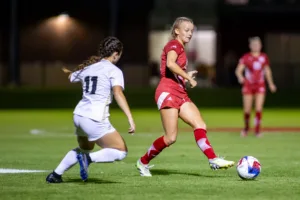 Nebraska Cornhuskers Sadie Waite (11) makes a pass against Purdue Boilermakers Brooke Haarala (11) in the first half during a college soccer game on Thursday, October 19, 2023, in Lincoln, Nebraska. Photo by John S. Peterson.