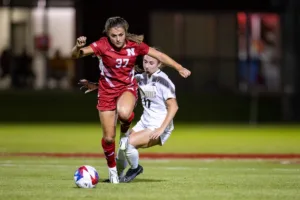 Nebraska Cornhuskers Jordan Zade (37) dribbles the ball against Purdue Boilermakers Brooke Haarala (11) in the first half during a college soccer game on Thursday, October 19, 2023, in Lincoln, Nebraska. Photo by John S. Peterson.