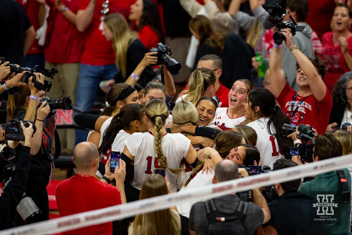 Nebraska Cornhusker celebrate a win over the Wisconsin Badgers in 5 sets during a college volleyball match on Saturday, October 21, 2023, in Lincoln, Nebraska. Photo by John S. Peterson.