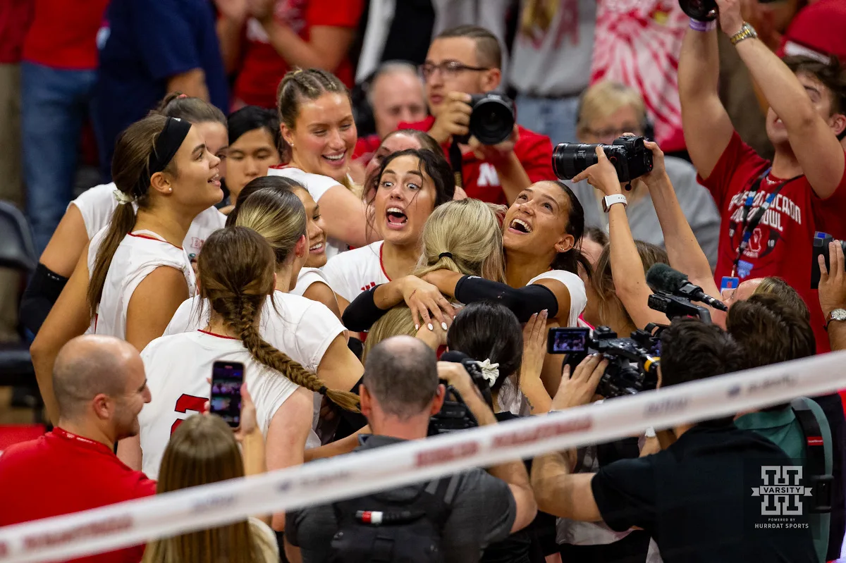 Nebraska Cornhusker celebrate a win over the Wisconsin Badgers in 5 sets during a college volleyball match on Saturday, October 21, 2023, in Lincoln, Nebraska. Photo by John S. Peterson.