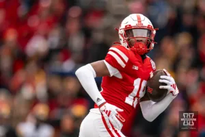 Nebraska Cornhuskers wide receiver Jaylen Lloyd (19 catches a touchdown pass over Iowa Hawkeyes defensive back Sebastian Castro (29) during a game in Lincoln, NE November 24th 2023. Photo by Eric Francis