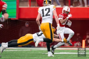 Nebraska Cornhuskers defensive back Ethan Nation (28) returns a kick during a game in Lincoln, NE November 24th 2023. Photo by Eric Francis