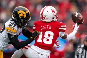 Nebraska Cornhuskers wide receiver Jaylen Lloyd (19) tries to pull in a pass over Iowa Hawkeyes defensive back Jermari Harris (27) during a game in Lincoln, NE November 24th 2023. Photo by Eric Francis