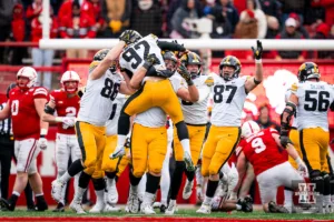 Iowa Hawkeyes celebrate a walk off field goal during a game against the Nebraska Cornhuskers in Lincoln, NE November 24th 2023. Photo by Eric Francis