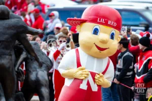 Nebraska Cornhusker mascot Lil' Red leads the Huskers on the Unity before the football game against the Maryland Terrapins on Saturday, November 11, 2023, in Lincoln, Nebraska. Photo by John S. Peterson.
