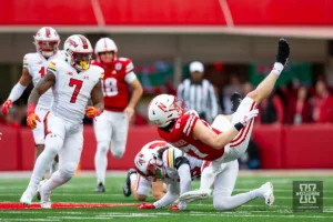Nebraska Cornhusker tight end Nate Boerkircher (87) gets a first down on a fake punt tackled by Maryland Terrapin defensive back Gavin Gibson (26) in in the first quarter during the football game on Saturday, November 11, 2023, in Lincoln, Nebraska. Photo by John S. Peterson.