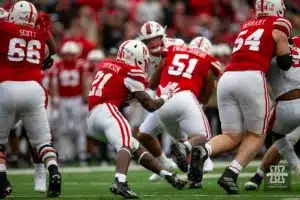 Nebraska Cornhusker running back Emmett Johnson (21) runs with the ball against the Maryland Terrapins in the second quarter during the football game on Saturday, November 11, 2023, in Lincoln, Nebraska. Photo by John S. Peterson.