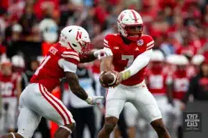 Nebraska Cornhusker quarterback Jeff Sims (7) hands the ball off to running back Emmett Johnson (21) in the second quarter against the Maryland Terrapins during the football game on Saturday, November 11, 2023, in Lincoln, Nebraska. Photo by John S. Peterson.