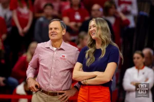 Nebraska Cornhusker head coach John Cook talks to former assistant coach and now Illinois Fighting Illini assistant coach Jen Tamas during warm-ups at the volleyball match on Sunday, November 12, 2023, in Lincoln, Nebraska. Photo by John S. Peterson.