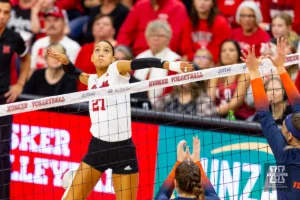 Nebraska Cornhusker Harper Murray (27) winds up to spike the ball against the Illinois Fighting Illini in the first set during the volleyball match on Sunday, November 12, 2023, in Lincoln, Nebraska. Photo by John S. Peterson.