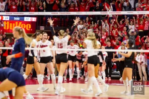 Nebraska Cornhuskers celebrate the win over the Illinois Fighting Illini in four sets during the volleyball match on Sunday, November 12, 2023, in Lincoln, Nebraska. Photo by John S. Peterson.