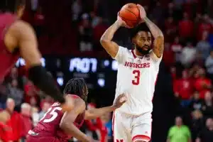 Nebraska Cornhusker guard Brice Williams (3) looks to pass against Rider Bronc Tyriek Weeks during the basketball game on Monday, November 13, 2023, in Lincoln, Nebraska. Photo by John S. Peterson.