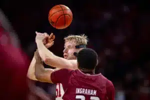 Nebraska Cornhusker forward Rienk Mast (51) has the ball punched out by Rider Bronc forward Tariq Ingraham (33) in the second half during the basketball game on Monday, November 13, 2023, in Lincoln, Nebraska. Photo by John S. Peterson.
