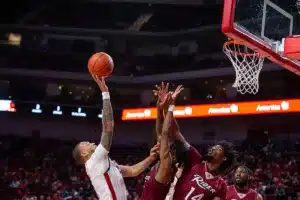 Nebraska Cornhusker guard C.J. Wilcher (0) puts up a layup against the Rider Broncs in the second half during the basketball game on Monday, November 13, 2023, in Lincoln, Nebraska. Photo by John S. Peterson.