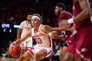 Nebraska Cornhusker forward Josiah Allick (53) dribbles the ball against Rider Bronc forward Tariq Ingraham (33) in the second half during the basketball game on Monday, November 13, 2023, in Lincoln, Nebraska. Photo by John S. Peterson.
