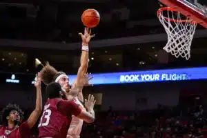 Nebraska Cornhusker forward Josiah Allick (53) puts up a layup against Rider Bronc forward Tariq Ingraham (33) in the second half during the basketball game on Monday, November 13, 2023, in Lincoln, Nebraska. Photo by John S. Peterson.