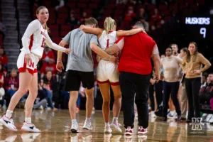 Nebraska Cornhusker guard Jaz Shelley (1) helped off the court after being injuried during the basketball game against the Alcorn State Lady Braves on Tuesday, November 14, 2023, in Lincoln, Nebraska. Photo by John S. Peterson.