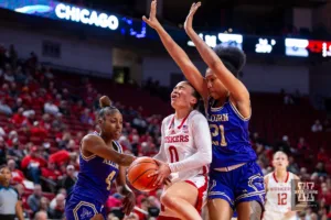 Nebraska Cornhusker guard Darian White (0) is fouled going for a layup against Alcorn State Lady Brave guard Kailyn Watkins (4) in the first half during the basketball game on Tuesday, November 14, 2023, in Lincoln, Nebraska. Photo by John S. Peterson.