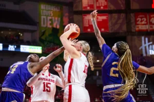 Nebraska Cornhusker forward Jessica Petrie (12) is fouled shooting against Alcorn State Lady Brave forward Arene Iyekekpolor (14) in the first half during the basketball game on Tuesday, November 14, 2023, in Lincoln, Nebraska. Photo by John S. Peterson.