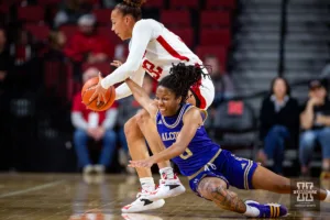 Nebraska Cornhusker guard Kendall Coley (32) keeps the ball away from Alcorn State Lady Brave forward Destiny Brown (5) in the second half during the basketball game on Tuesday, November 14, 2023, in Lincoln, Nebraska. Photo by John S. Peterson.