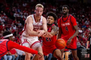 Nebraska Cornhusker forward Rienk Mast (51) has the ball knocked away by Stony Brook Seawolf guard Andre Snoddy (21) in the first half during the basketball game on Wednesday, November 15, 2023, in Lincoln, Nebraska. Photo by John S. Peterson.