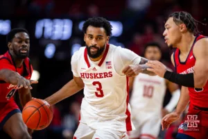 Nebraska Cornhusker guard Brice Williams (3) drives the lane against Stony Brook Seawolf guard Aaron Clarke (5) in the second half during the basketball game on Wednesday, November 15, 2023, in Lincoln, Nebraska. Photo by John S. Peterson.