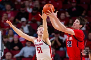 Nebraska Cornhusker forward Rienk Mast (51) reaches for the ball against Stony Brook Seawolf center Keenan Fitzmorris (32) in the first half during the basketball game on Wednesday, November 15, 2023, in Lincoln, Nebraska. Photo by John S. Peterson.