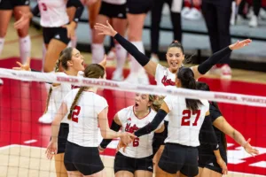 Nebraska Cornhuskers celebrate a point against the Michigan Wolverines in the second set during the volleyball match on Friday, November 17, 2023, in Lincoln, Nebraska. Photo by John S. Peterson.