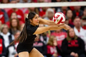 Nebraska Cornhusker Lexi Rodriguez (8) digs the ball against the Michigan Wolverines in the first set during the volleyball match on Friday, November 17, 2023, in Lincoln, Nebraska. Photo by John S. Peterson.