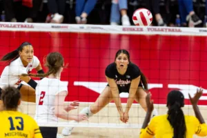 Nebraska Cornhusker Lexi Rodriguez (8) digs the ball against the Michigan Wolverines in the third set during the volleyball match on Friday, November 17, 2023, in Lincoln, Nebraska. Photo by John S. Peterson.