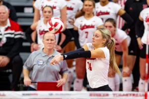 Nebraska Cornhusker Ally Batenhorst (14) digs the ball against the Michigan Wolverines in the third set during the volleyball match on Friday, November 17, 2023, in Lincoln, Nebraska. Photo by John S. Peterson.